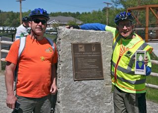John Andrews and son in front of ET's John R. Andrews bridge in Saco