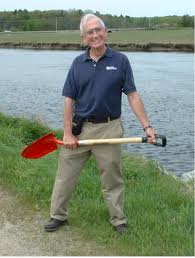 John Andrews holding a shovel.